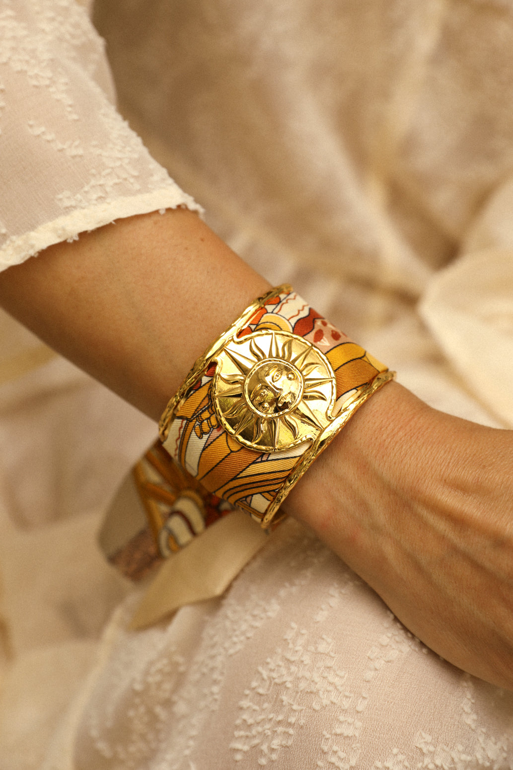 Large Sun and Ribbon Cuff Unknown Address, Snow