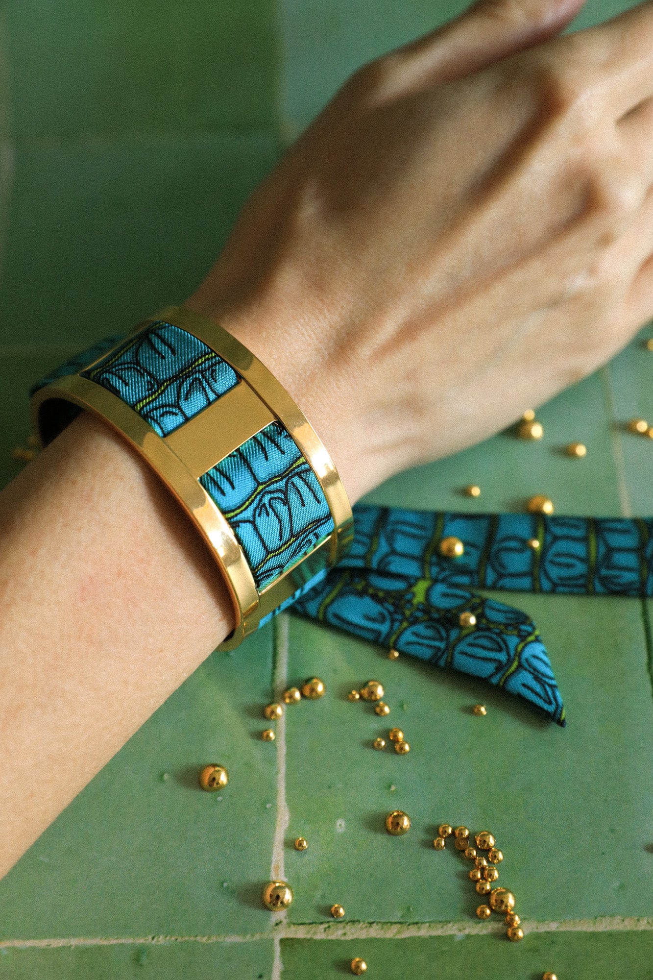 JMA cuff and its aqua Croco ribbon