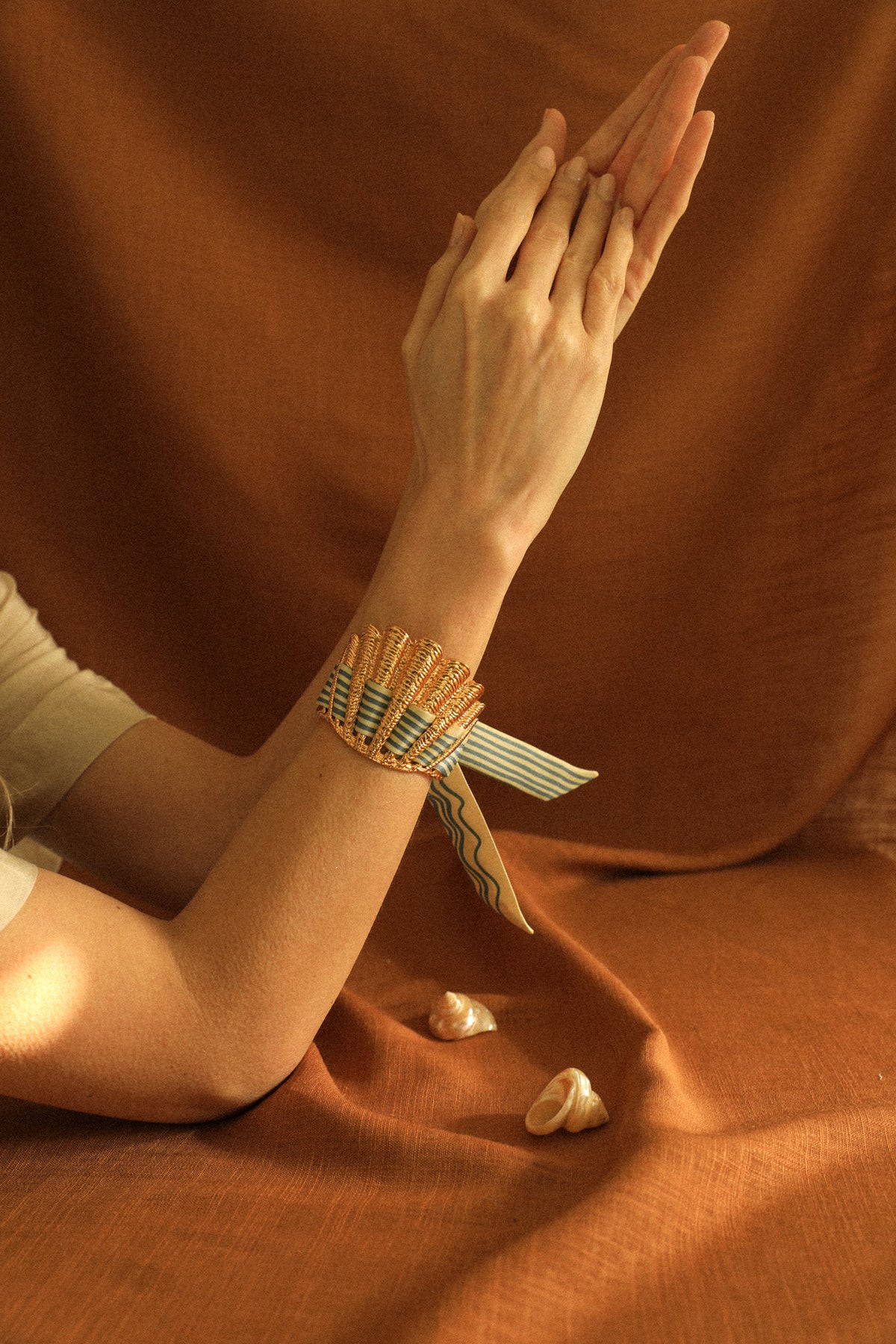 Shell cuff and neutral sailor ribbon