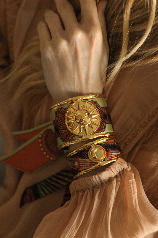 Sun cuff and colorful shell ribbon