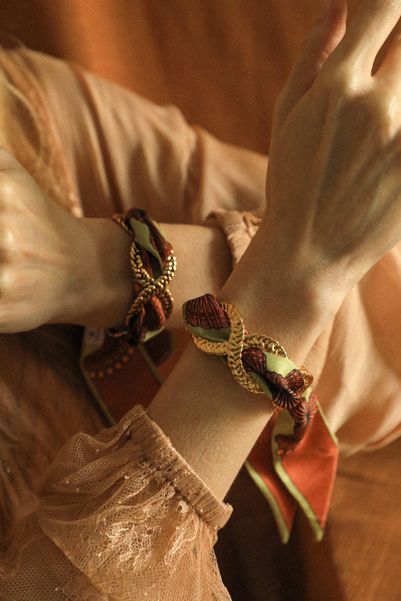 Braid and ribbon cuff in neutral shell