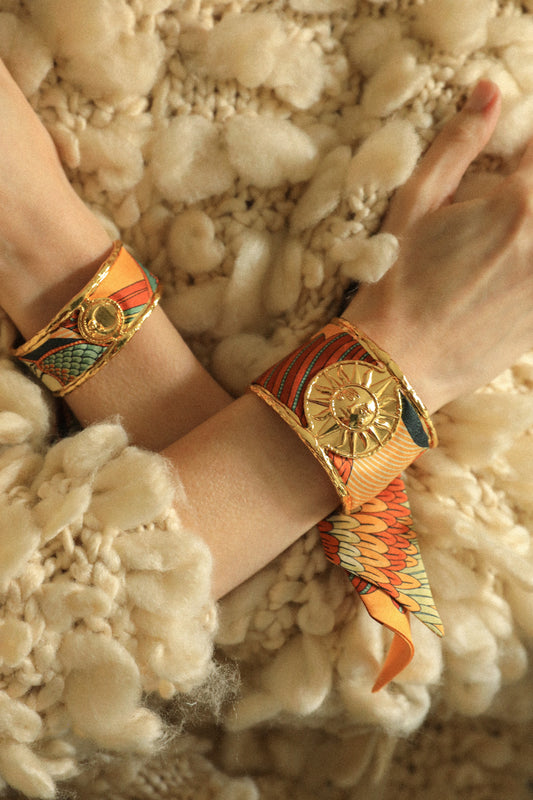 Sun cuff and neutral parrot ribbon