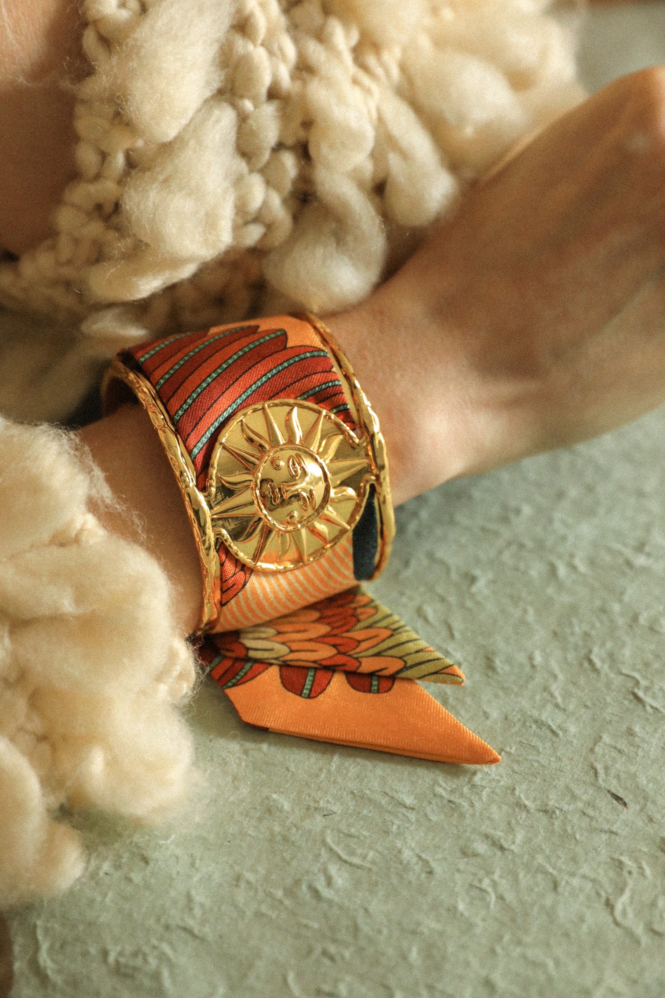 Sun cuff and neutral parrot ribbon
