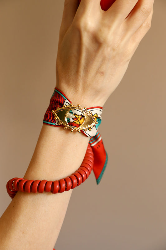 Ornement Bon Oeil doré et son bracelet en soie de 4cm Tarot, multicolore