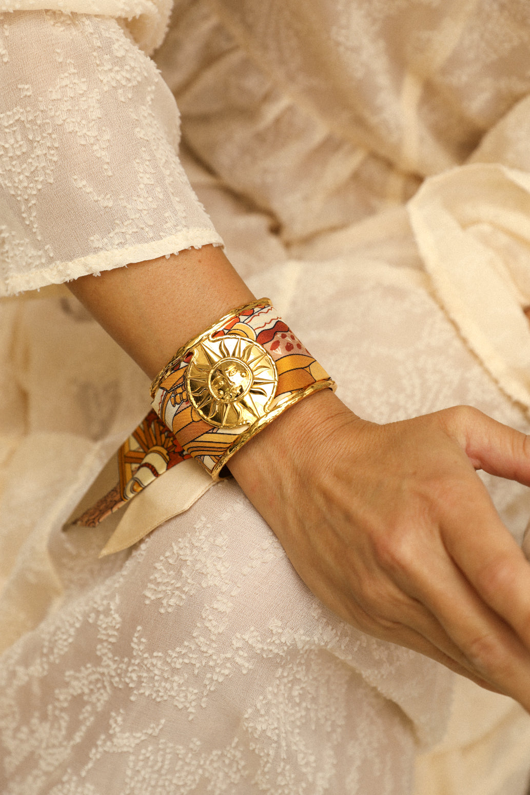 Large Sun and Ribbon Cuff Unknown Address, Snow