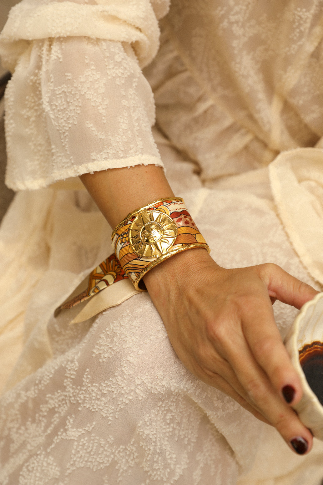 Large Sun and Ribbon Cuff Unknown Address, Snow