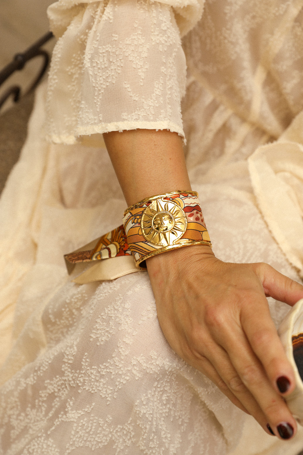 Large Sun and Ribbon Cuff Unknown Address, Snow