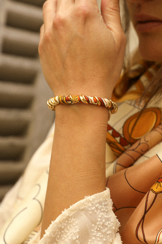 October bracelet and its ribbon Unknown address, snow