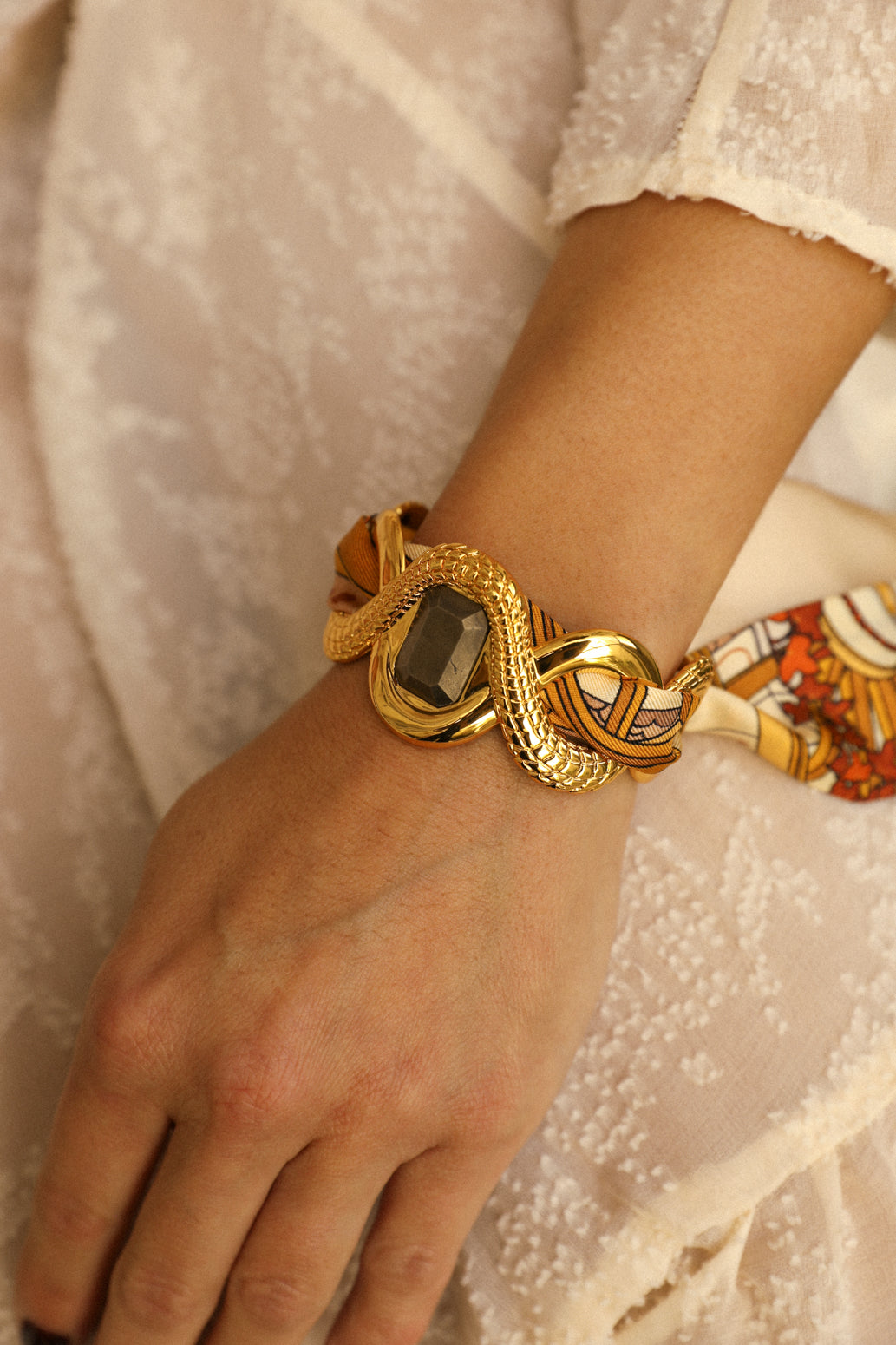 Caiman cuff with pyrite and ribbon Unknown Address, Snow