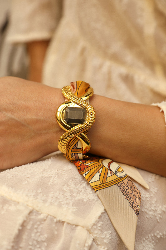 Caiman cuff with pyrite and ribbon Unknown Address, Snow