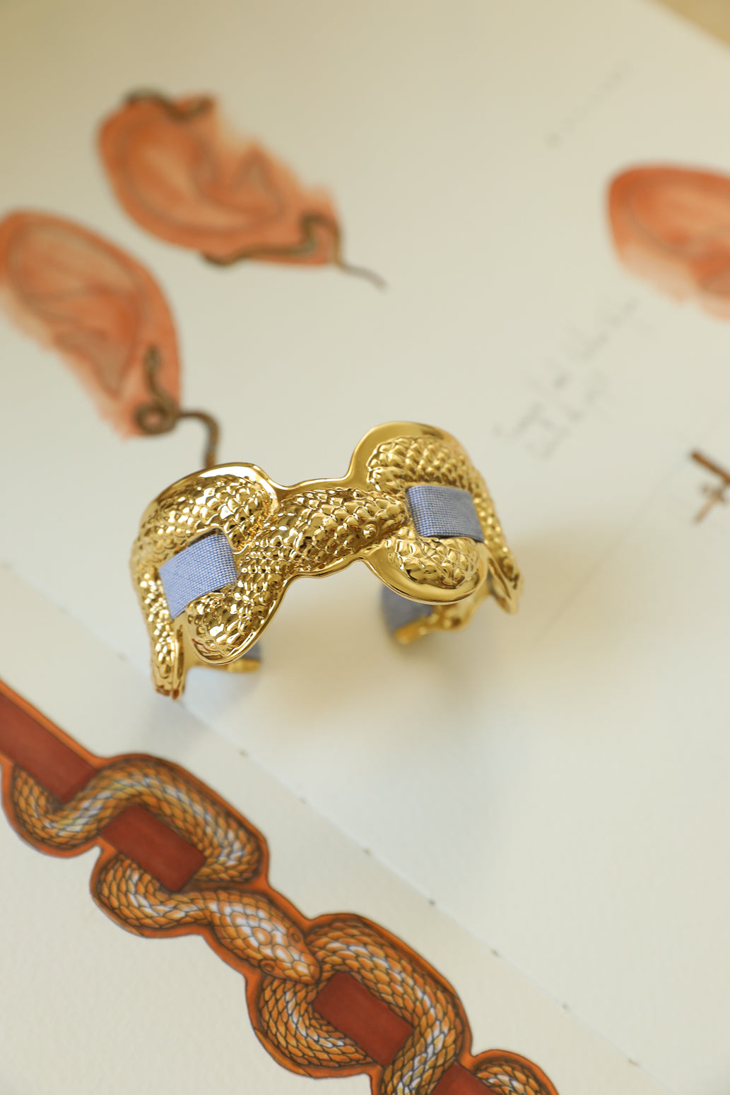 Upcycled Serpentaire cuff with neon pink gingham