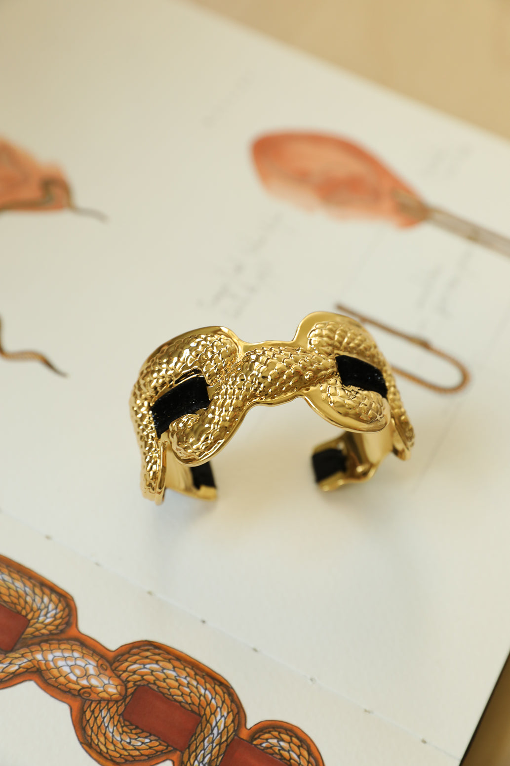 Upcycled Serpentaire cuff with neon pink gingham