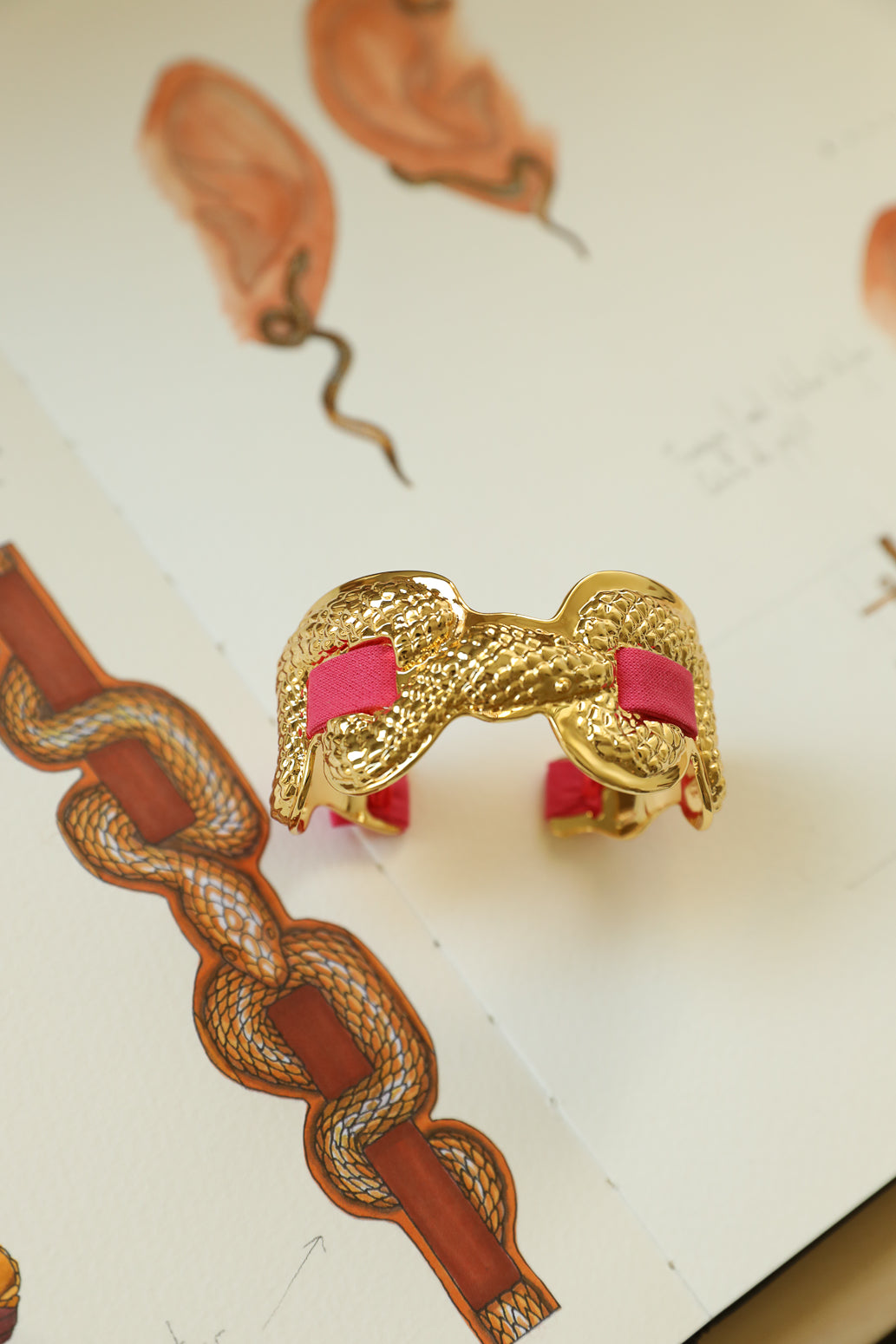 Upcycled Serpentaire cuff with neon pink gingham