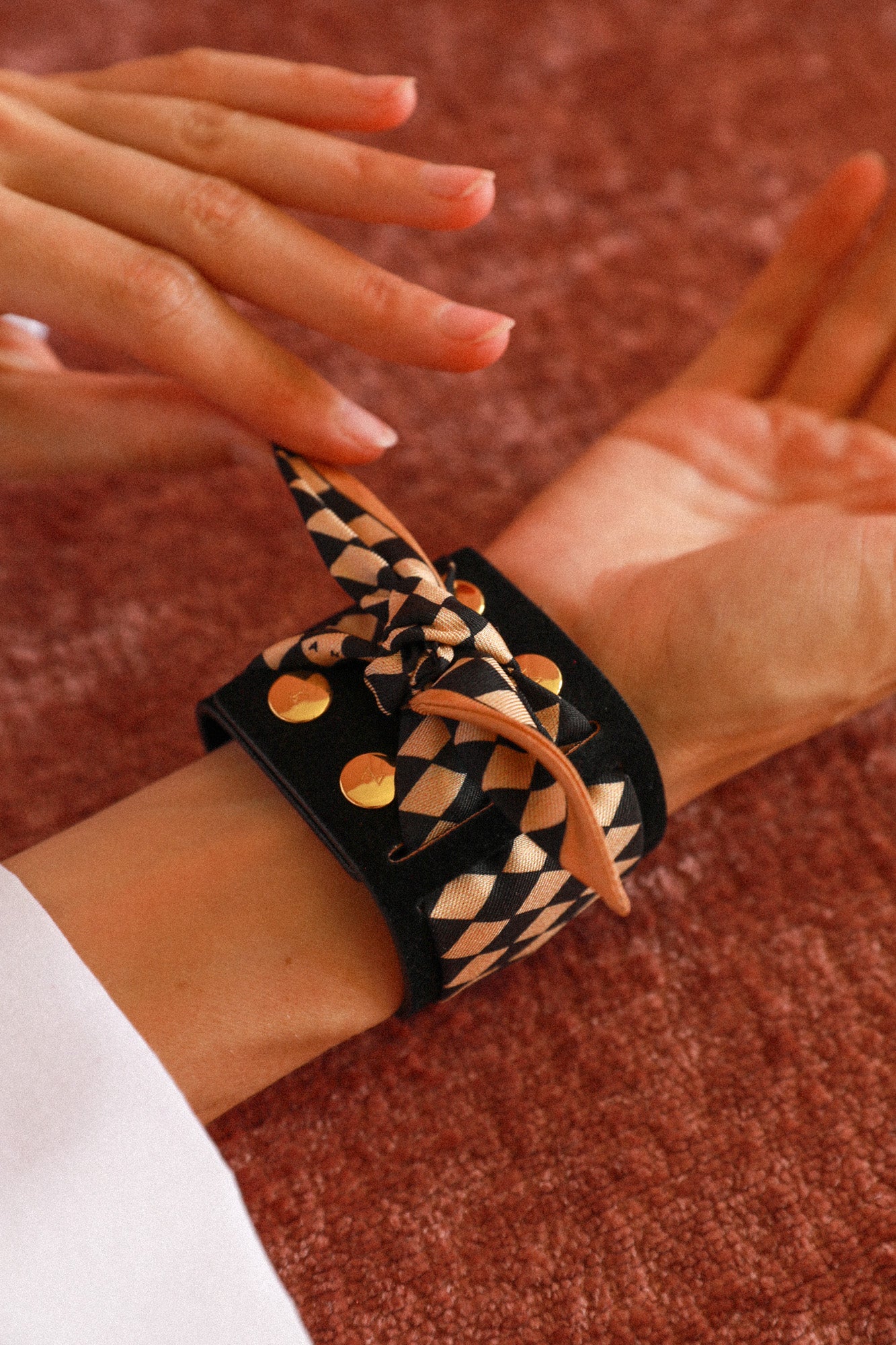 Circus cuff and Harlequin ribbon, beige and black