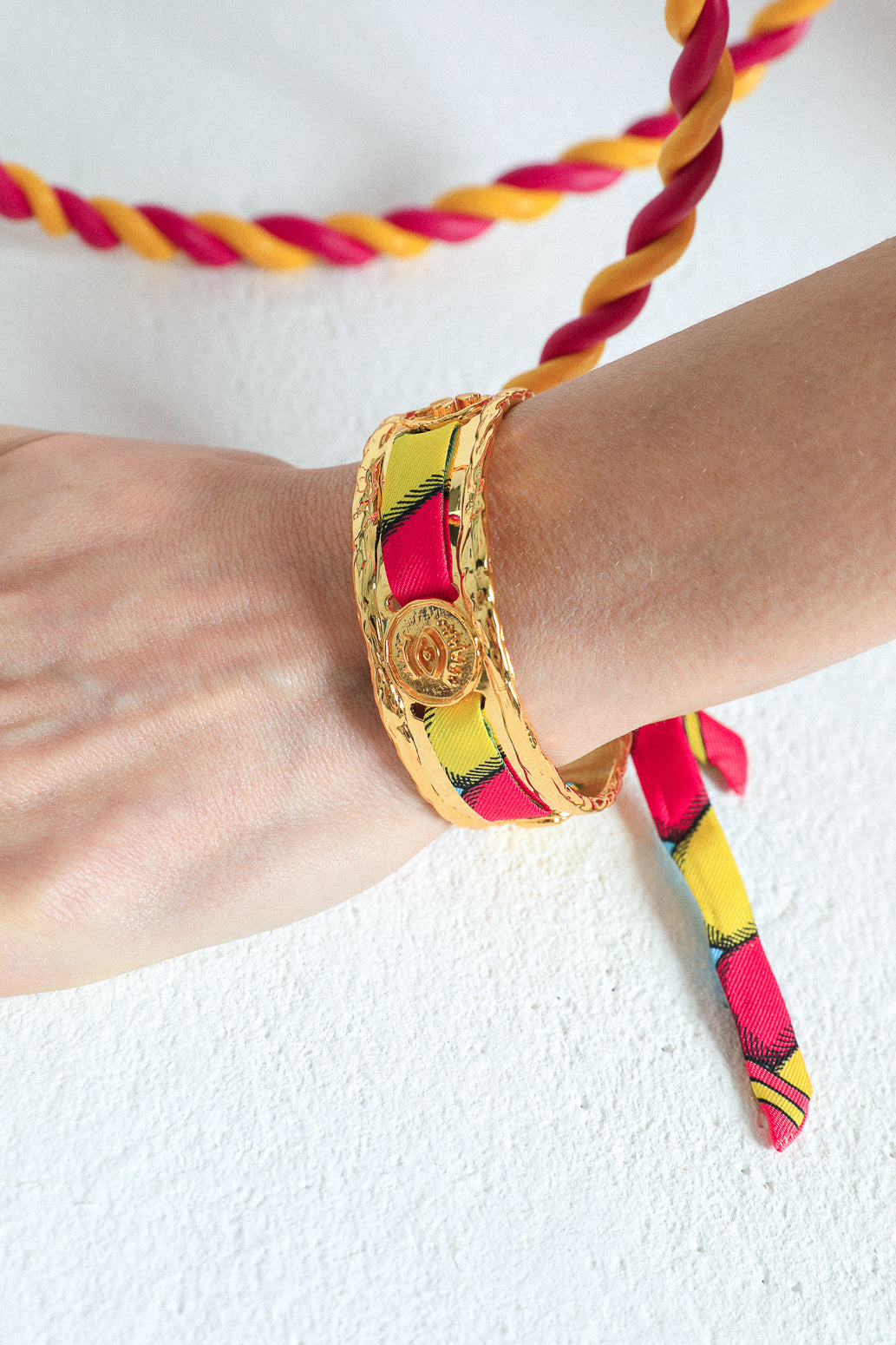 Irma cuff and its Blue Words ribbon