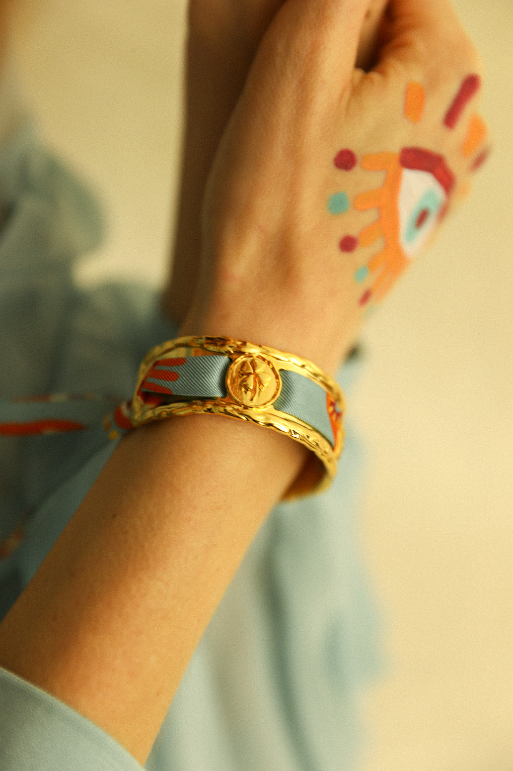 Irma cuff and its Blue Words ribbon
