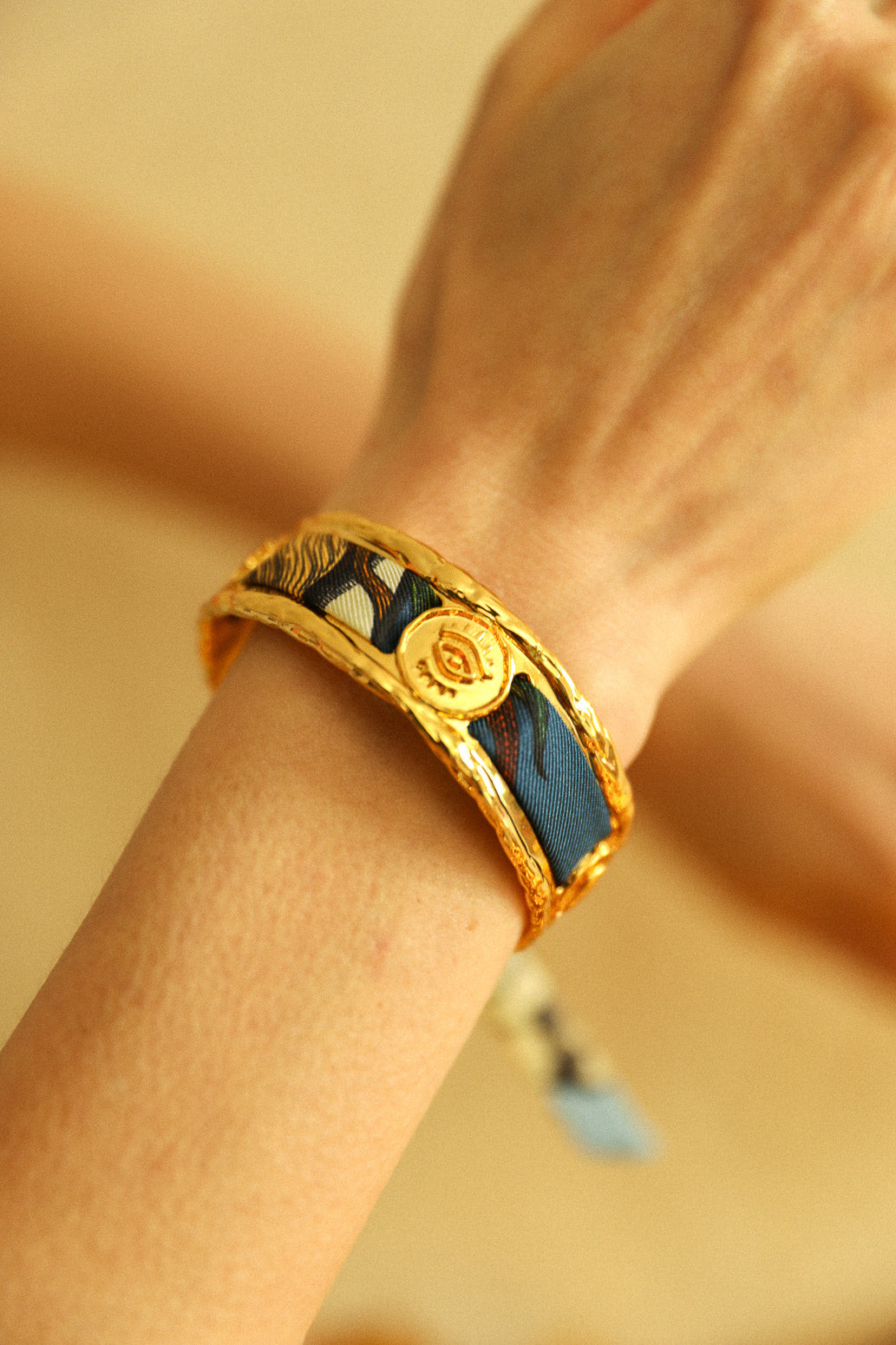 Irma cuff and its Blue Words ribbon